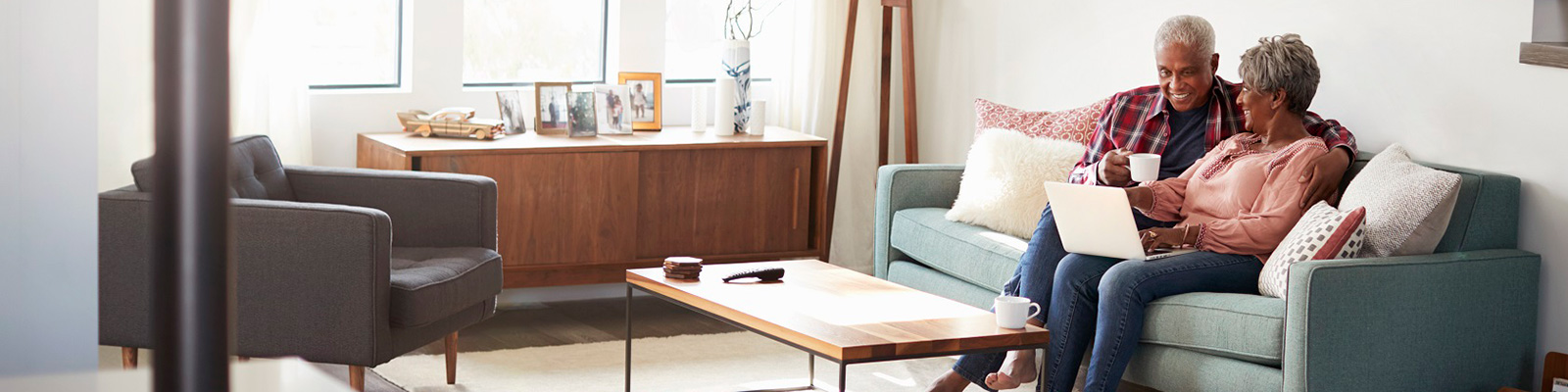 couple sitting on couch living room