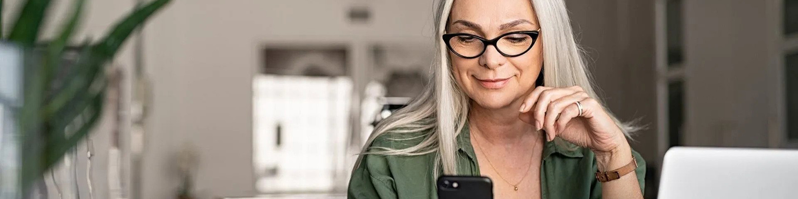 lady on mobile and computer