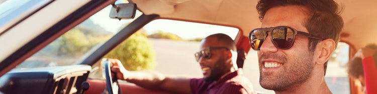 Two male people in car