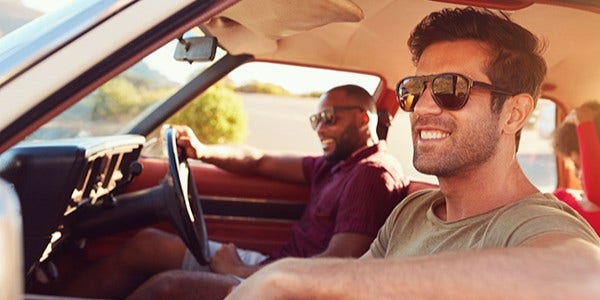 Two male friends in car